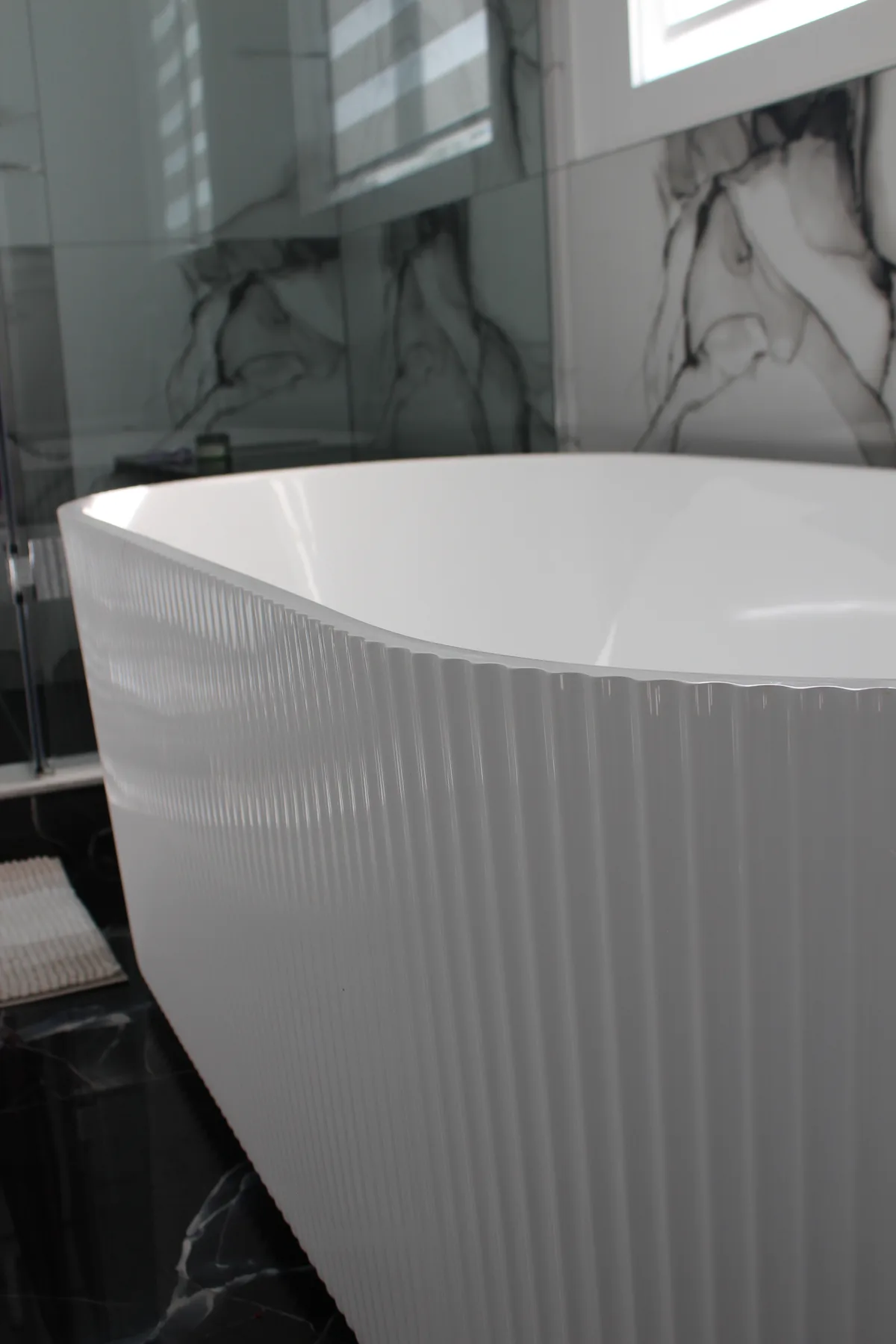 Bathroom Renovation with Sculptural Bathtub: finished detail 2