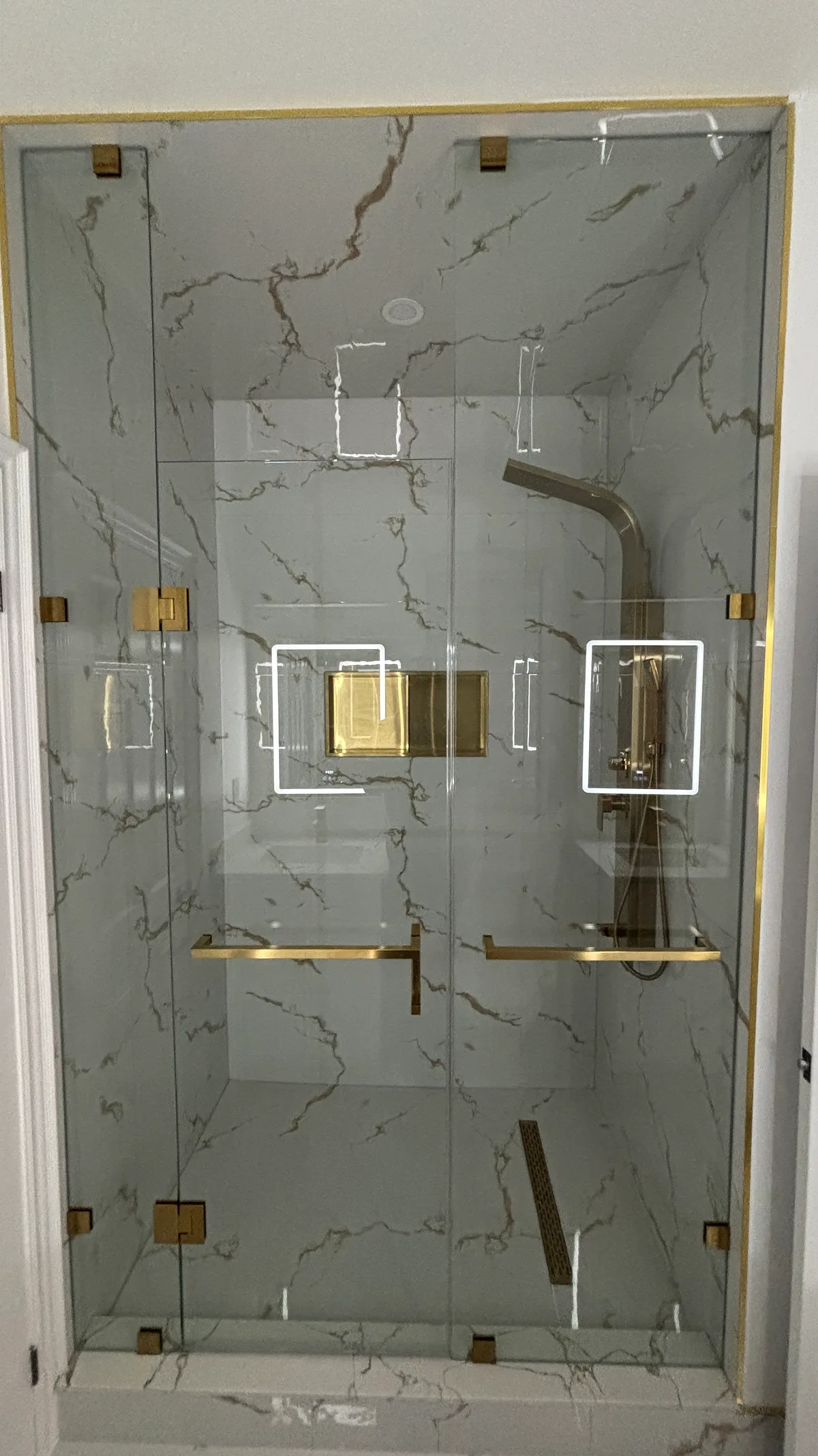 Compact Bathroom Renovation with Gold Accents: finished detail 3